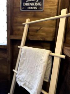 a towel hanging on a towel rack in a room at Modern and spacious house with Hot Tub in Lincolnshire