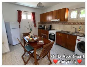 Η κουζίνα ή μικρή κουζίνα στο Stella Apartment in Almyrida slechts 350m vanaf het strand, auto huren niet nodig