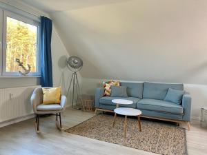 Istumisnurk majutusasutuses discovAIR Graal Müritz- Apartment Johanna- Strandnah mit Netflix
