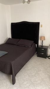 Кровать или кровати в номере Casa MoraZ Negro