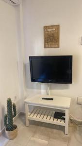 TV a/nebo společenská místnost v ubytování Apartamento Melina Arlu - Barrio La Victoria