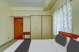 Ένα ή περισσότερα κρεβάτια σε δωμάτιο στο Relax Suites