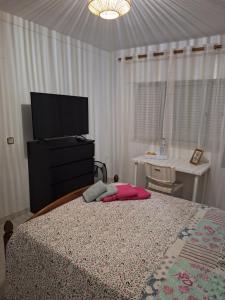 Postel nebo postele na pokoji v ubytování Quarto Pelegrini