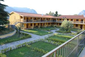a large building with a large patio area at La Perla in Monte Isola
