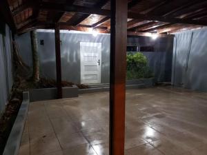 an empty patio with a door in a building at Encanto Caribeño en Levittown Lakes Puerto Rico in Levittown +57 photos