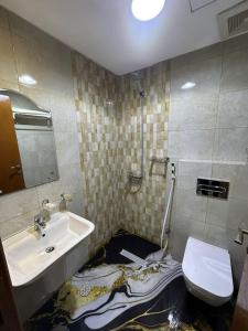 Koupelna v ubytování فندق اسكنت الذهبية - Askant Golden Hotel