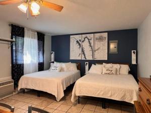 Ένα ή περισσότερα κρεβάτια σε δωμάτιο στο Holiday Hills Resort +64 φωτογραφίες