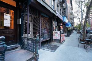 a storefront of a store on a city street at 83-2FE UES Central Park Newly Furnished Studio in New York