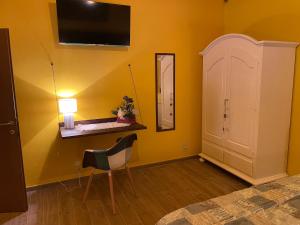 TV a/nebo společenská místnost v ubytování A casa di Bice + 9 fotografií