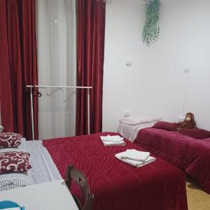 Posteľ alebo postele v izbe v ubytovaní B&B Appartamenti NAPOLI