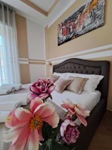 A bed or beds in a room at Affittacamere ELVI