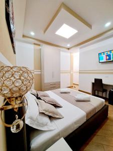 A bed or beds in a room at Affittacamere ELVI