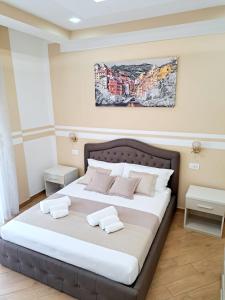 A bed or beds in a room at Affittacamere ELVI
