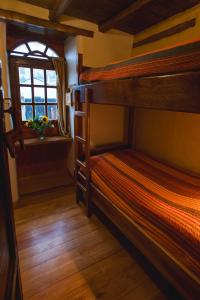 Letto o letti in una camera di Llullu Llama Mountain Lodge