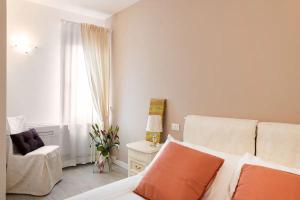 Postel nebo postele na pokoji v ubytování Venice Ivory room