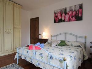En eller flere senge i et værelse på Casa vacanze Lulù