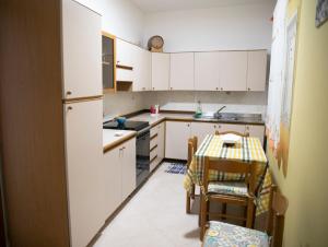 Η κουζίνα ή μικρή κουζίνα στο Casa Vacanze Zia Maria