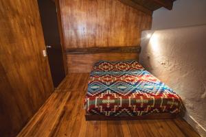 Letto o letti in una camera di Llullu Llama Mountain Lodge