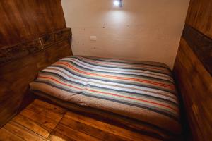 Letto o letti in una camera di Llullu Llama Mountain Lodge