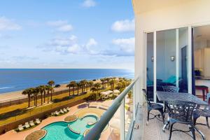a balcony with a view of the ocean at Diamond Beach Resort: Galveston Gem #514 in Galveston