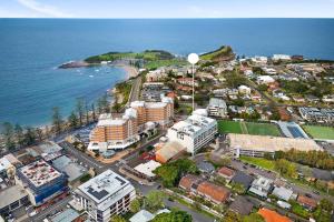 an aerial view of a city next to the ocean at Modern & Cozy Unit Just Steps from Terrigal Beach in Terrigal