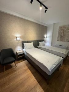 Letto o letti in una camera di Triangle Rooms