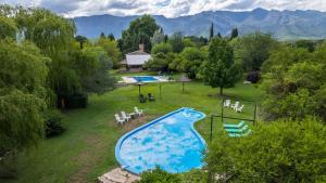 an aerial view of a swimming pool in a yard at Cabañas Ocho Soles in Las Rabonas