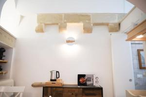 A kitchen or kitchenette at San Biagio di sotto