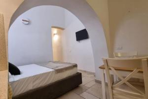 A bed or beds in a room at San Biagio di sotto