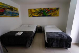 Postel nebo postele na pokoji v ubytování Hotel Tayromar