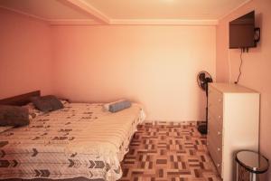 Postel nebo postele na pokoji v ubytování Hostal el hermanito