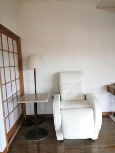 Зона вітальні в Villa Yukar Onsen Hot Spring 広々ゆったり空間の温泉付別荘ヴィラユカラ