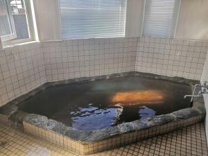 Зображення з фотогалереї помешкання Villa Yukar Onsen Hot Spring 広々ゆったり空間の温泉付別荘ヴィラユカラ у місті Shiraoi