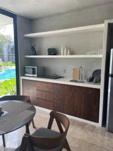 Η κουζίνα ή μικρή κουζίνα στο Tulum Sweet Condo with private pool