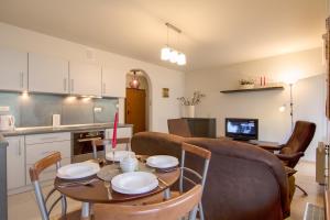 Kuchyňa alebo kuchynka v ubytovaní Apartament Storczyk Zakopane