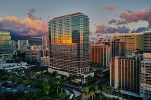 a view of a city skyline with buildings at Ka La'i Waikiki Beach, LXR Hotels & Resorts in Honolulu