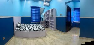 Uma cama ou camas num quarto em Prime PH Home