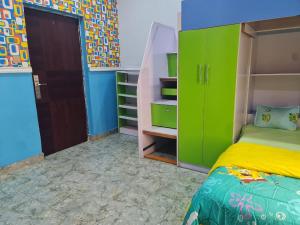 Uma cama ou camas num quarto em Prime PH Home