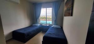 Postel nebo postele na pokoji v ubytování Come to Paradise an be our Guest in Dream Cancun!! + 25 fotografií