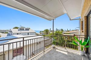 a balcony with a view of the ocean at Quaint 2-Bed Beach Abode with Ocean Views in Alexandra Headland