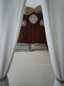 a bunk bed with curtains in a room at #Apartamento aconchegante no Flamengo - RIO in Rio de Janeiro