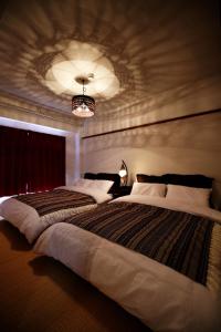 En eller flere senge i et værelse på 高原マンション 201