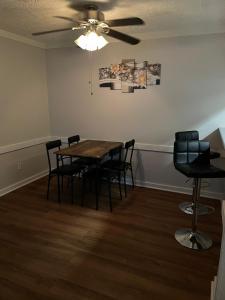 a dining room with a table and chairs at Blessing Home IN in Indianapolis