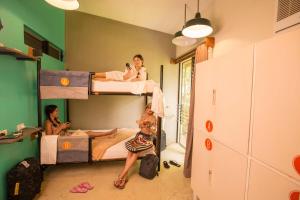 Postel nebo postele na pokoji v ubytování Spin Designer Hostel - El Nido