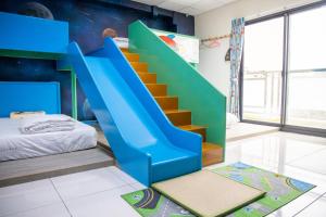 Una cama o camas en una habitación de 宜家莊親子民宿