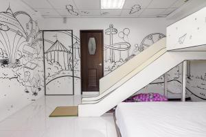 Una cama o camas en una habitación de 宜家莊親子民宿