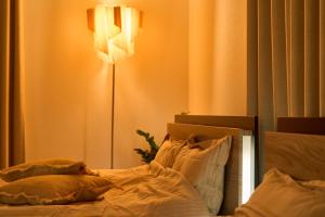 Ένα ή περισσότερα κρεβάτια σε δωμάτιο στο BETTEI +16 φωτογραφίες