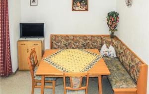 Telewizja i/lub zestaw kina domowego w obiekcie Ferienwohnung In Aschau