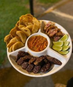 a plate of food with different types of food at Hotel Campestre Veredal - Quindío - Eje Cafetero in Montenegro