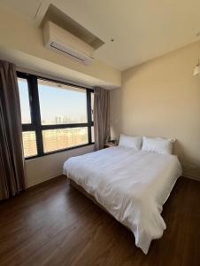 Снимка в галерията на Anping Nordic sea view three bedrooms в Тайнан